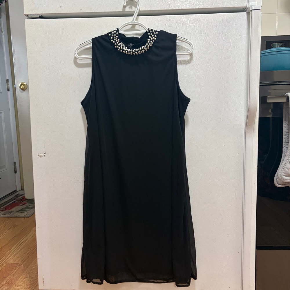 Chic Black Dress with Embellished Neckline